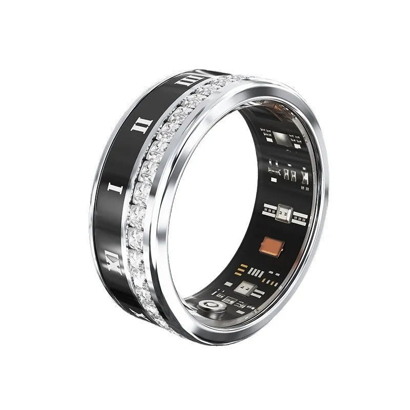 Diamond inlaid smart ring in silver and gold on finger, showing health tracking sensors.