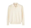 Milky white pure wool lapel collar polo sweater laid flat, showing loose fit and long sleeves.