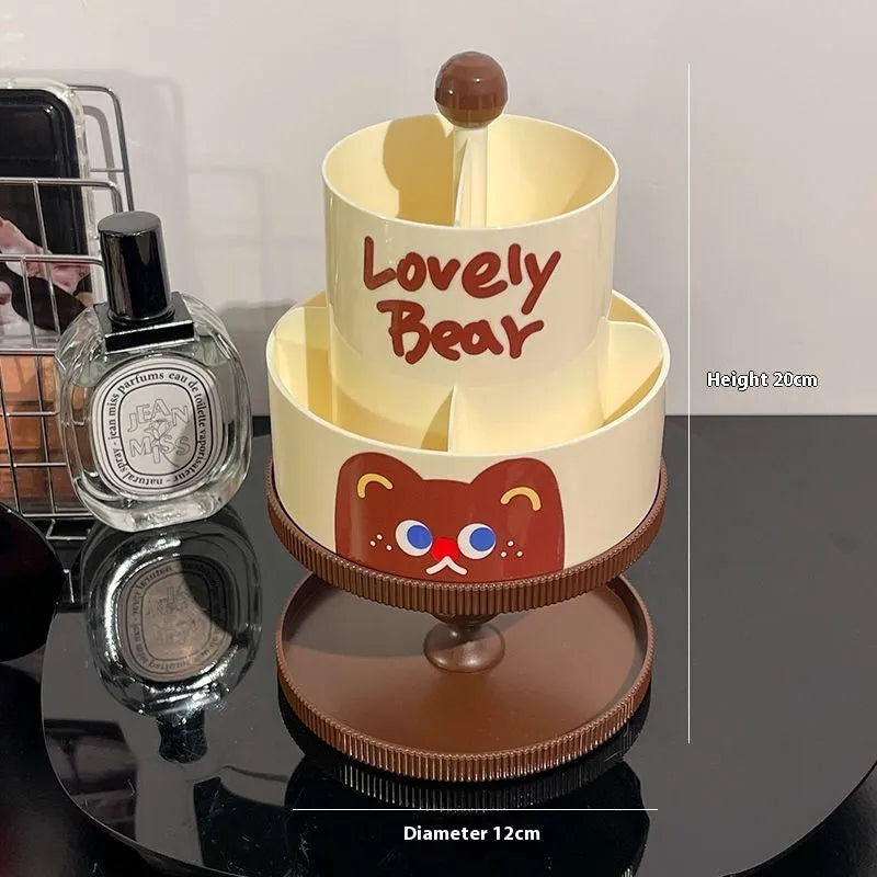 Beige rotating cosmetic brush storage barrel with open lid showing internal organiser rack