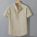 Men's beige casual linen shirt with stand collar and short sleeves in a loose, relaxed fit.