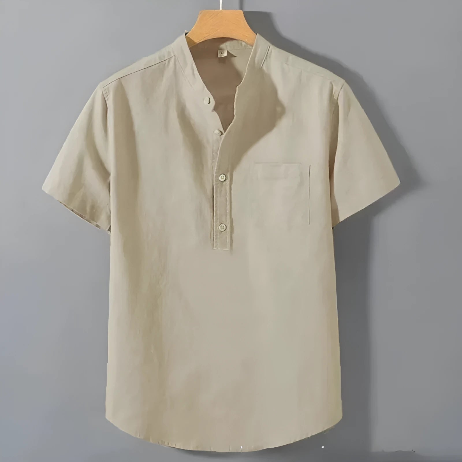 Men's beige casual linen shirt with stand collar and short sleeves in a loose, relaxed fit.