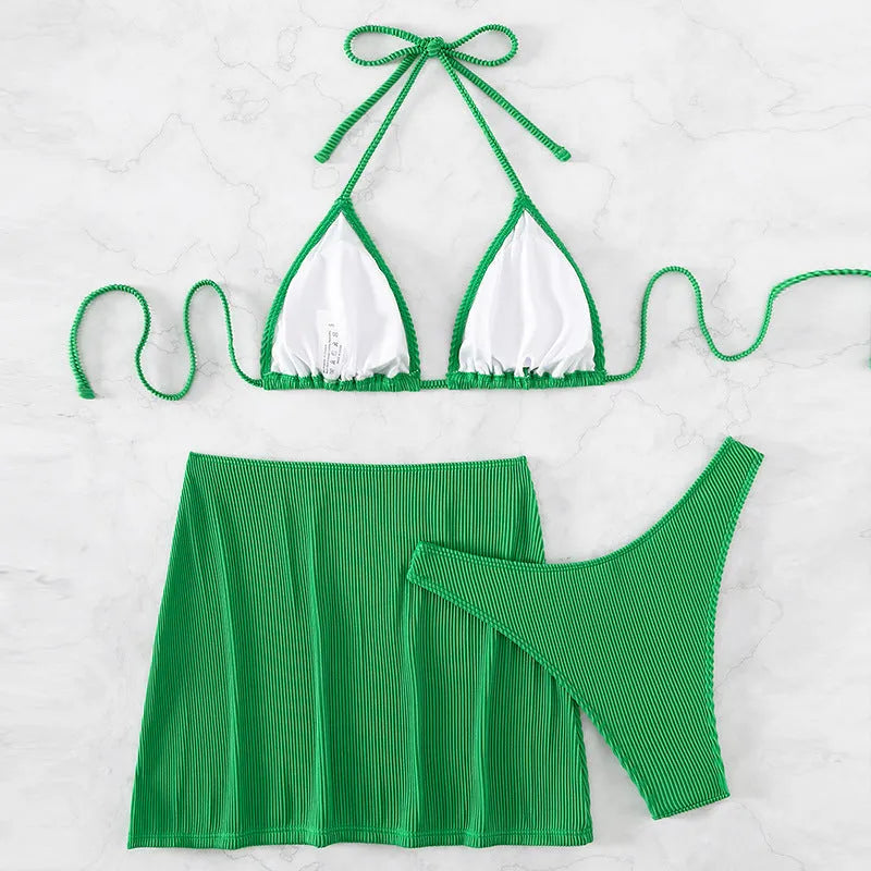 Women's three-piece ribbed bikini swimsuit set in green colour.
