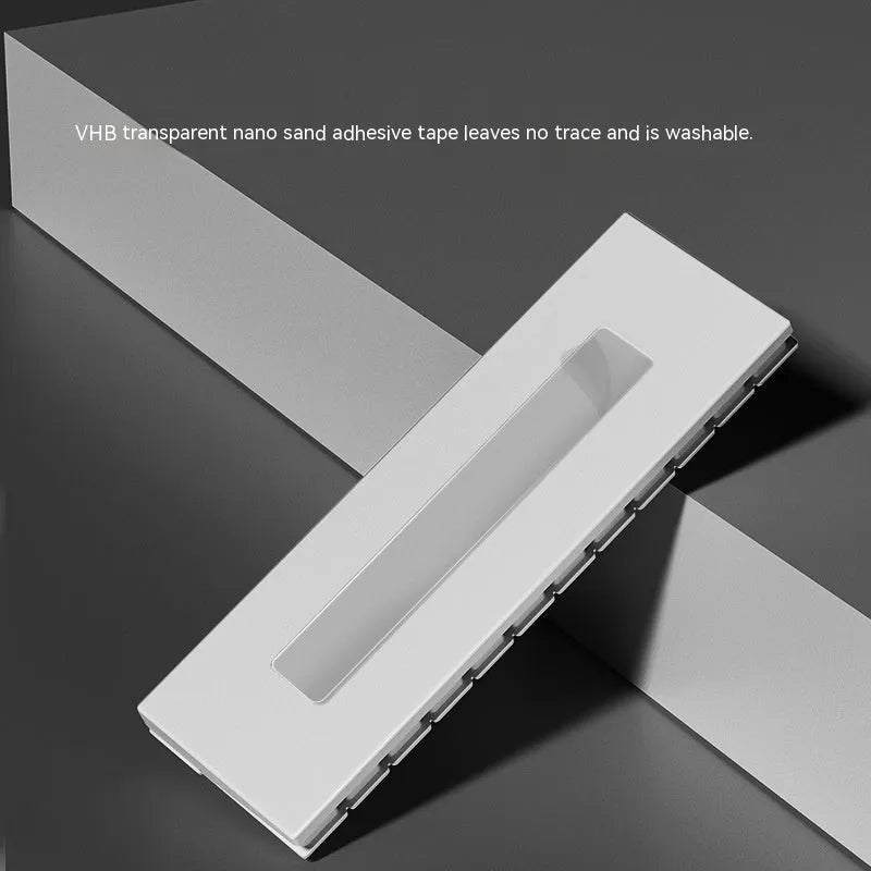 Black and white plastic piano-shaped temporary parking sign for car dashboards.