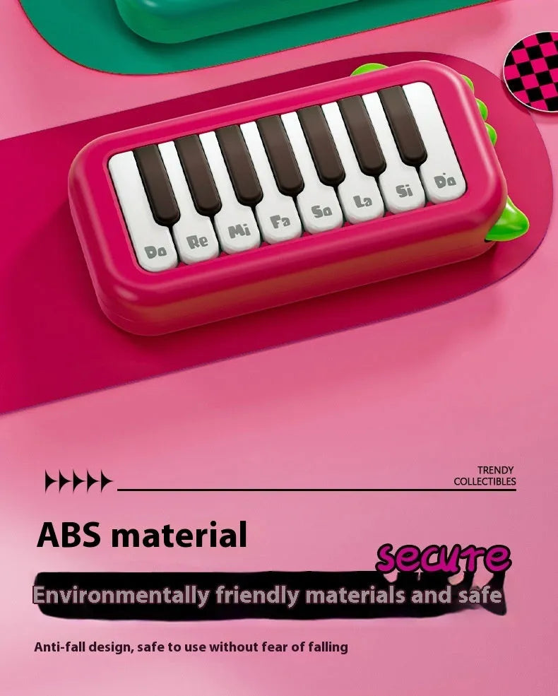 Baby pocket electronic keyboard toy in Little Piano Pattern design, shown in green and pink colour options.