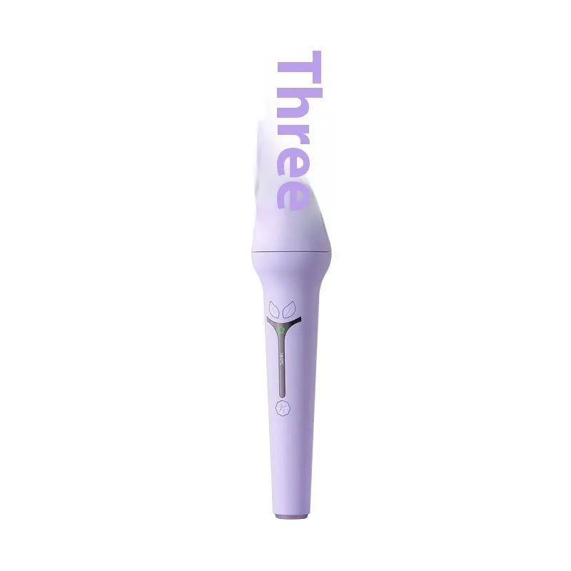 Light purple automatic hair curler with 32mm anion barrel, three clips, and a comb on a white background.