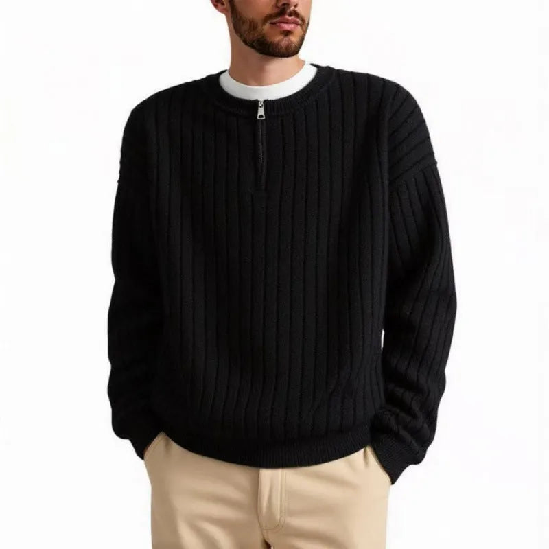 A grey men's textured knit half-zip pullover sweater on a hanger, showing the loose fit and long sleeves.