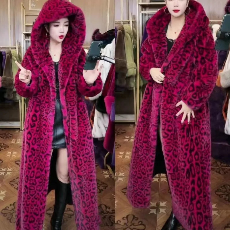 Long brown leopard print faux fur coat on a plus-size model, showing its 100cm length and loose fit.