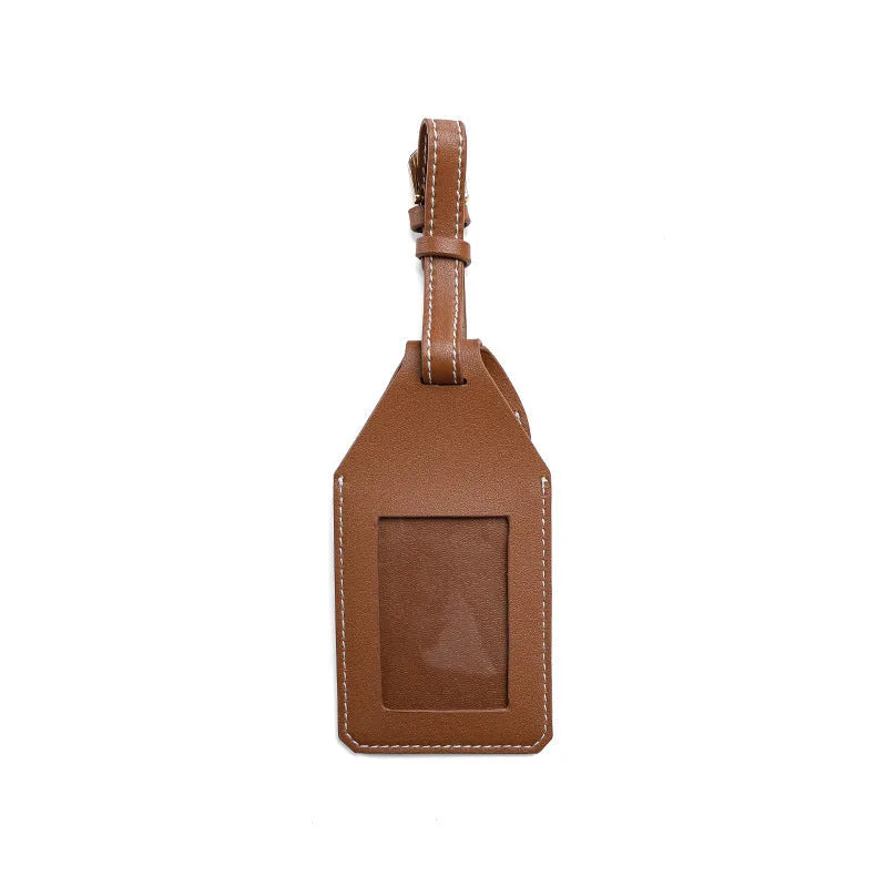 Luggage tracker protective case in black, brown and orange colours made from PU/PVC material
