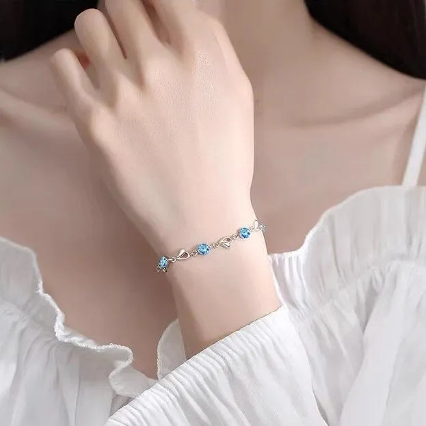 Blue diamond colour heart necklace and bracelet set with geometric shape and mixed gem inlay on copper.