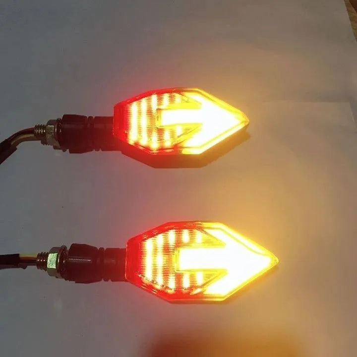 Arrow-shaped LED motorcycle turn signal lamp with 12V universal fitment and ABS plastic housing
