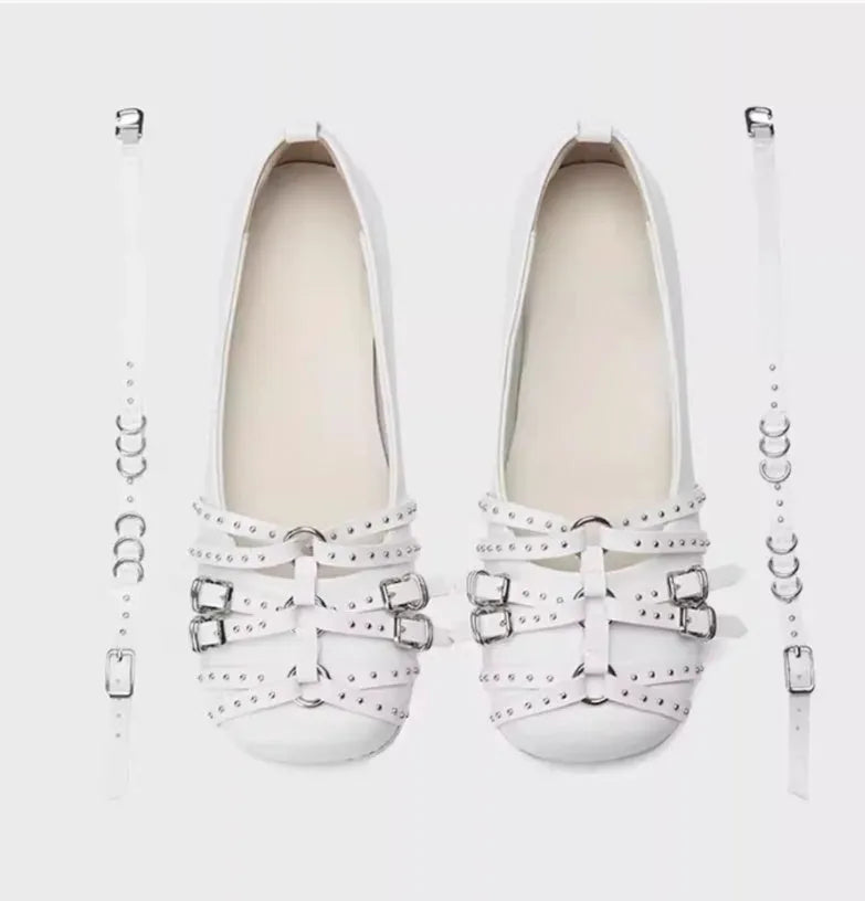 Women's black retro leather pumps with a square toe and silver buckle fastening.