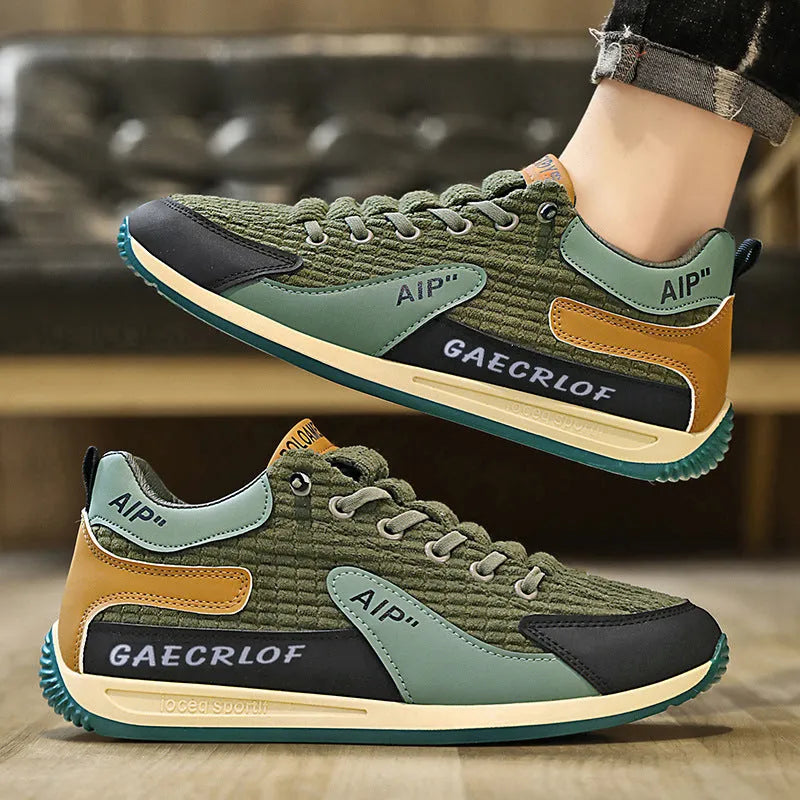 Men's green and grey mesh running shoes with low-top design and lace-up closure