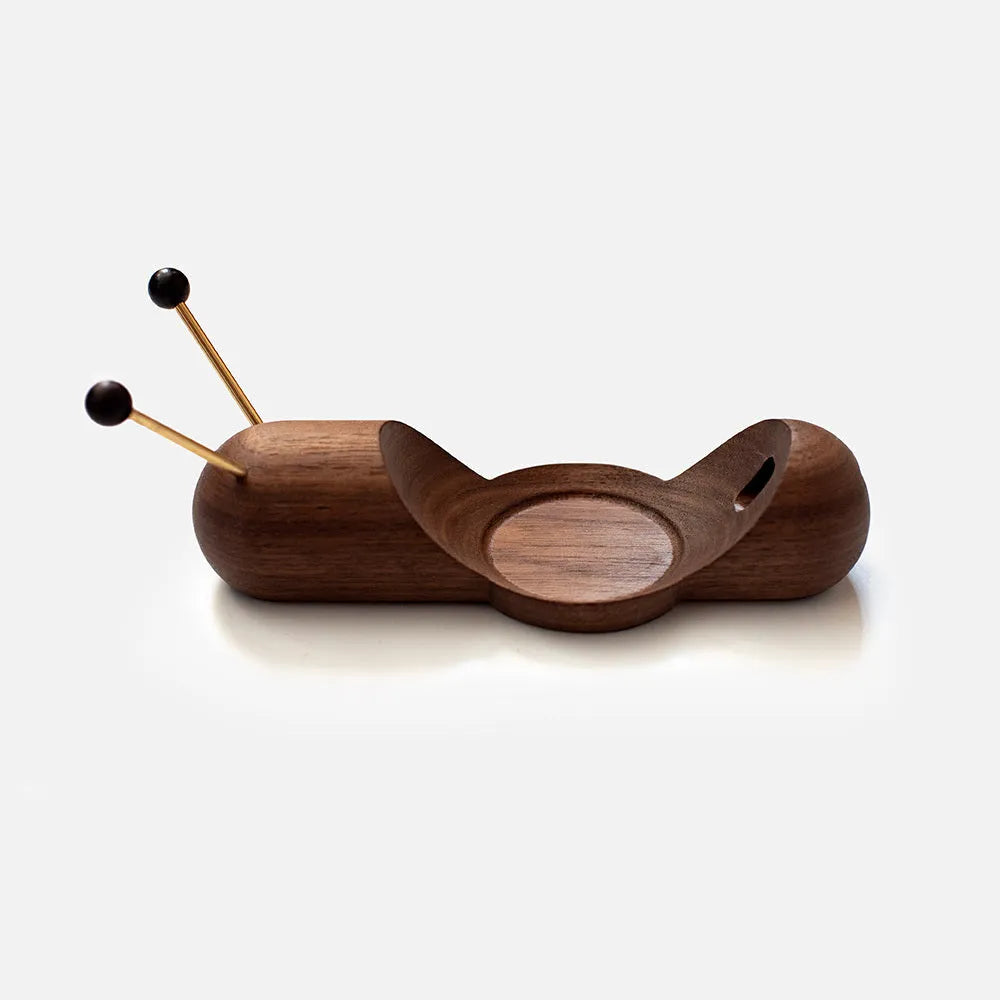 Khaki brown non-slip desktop bracket holder for a Bluetooth speaker like the HomePod.