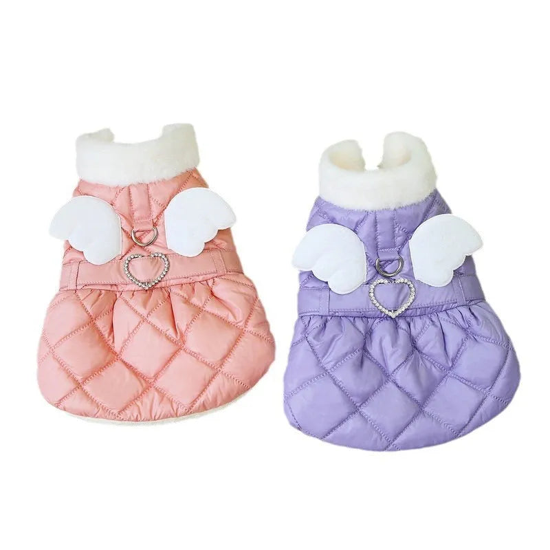 Small dog wearing pink cotton-thickened polyester skirt with cute angel design