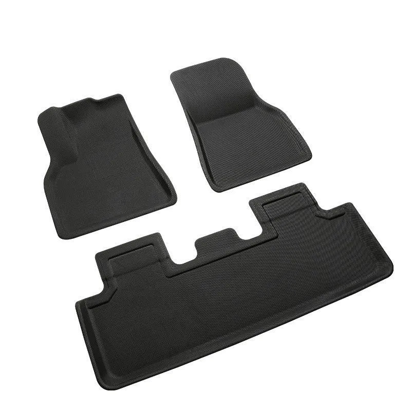 TPR floor mat set for Tesla Model Y including foot mats, front storage box mat, and tailbox mats