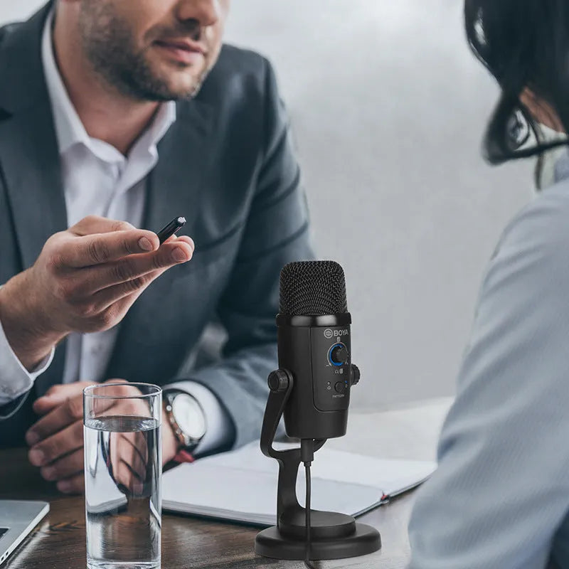 Black Boya BY-PM500 USB microphone with built-in sound card and Type-C port on a stand.