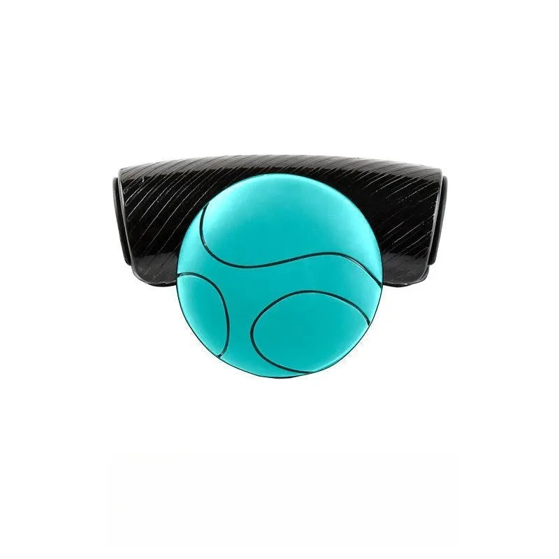 Black silicone steering wheel assist ball for single-handed driving control
