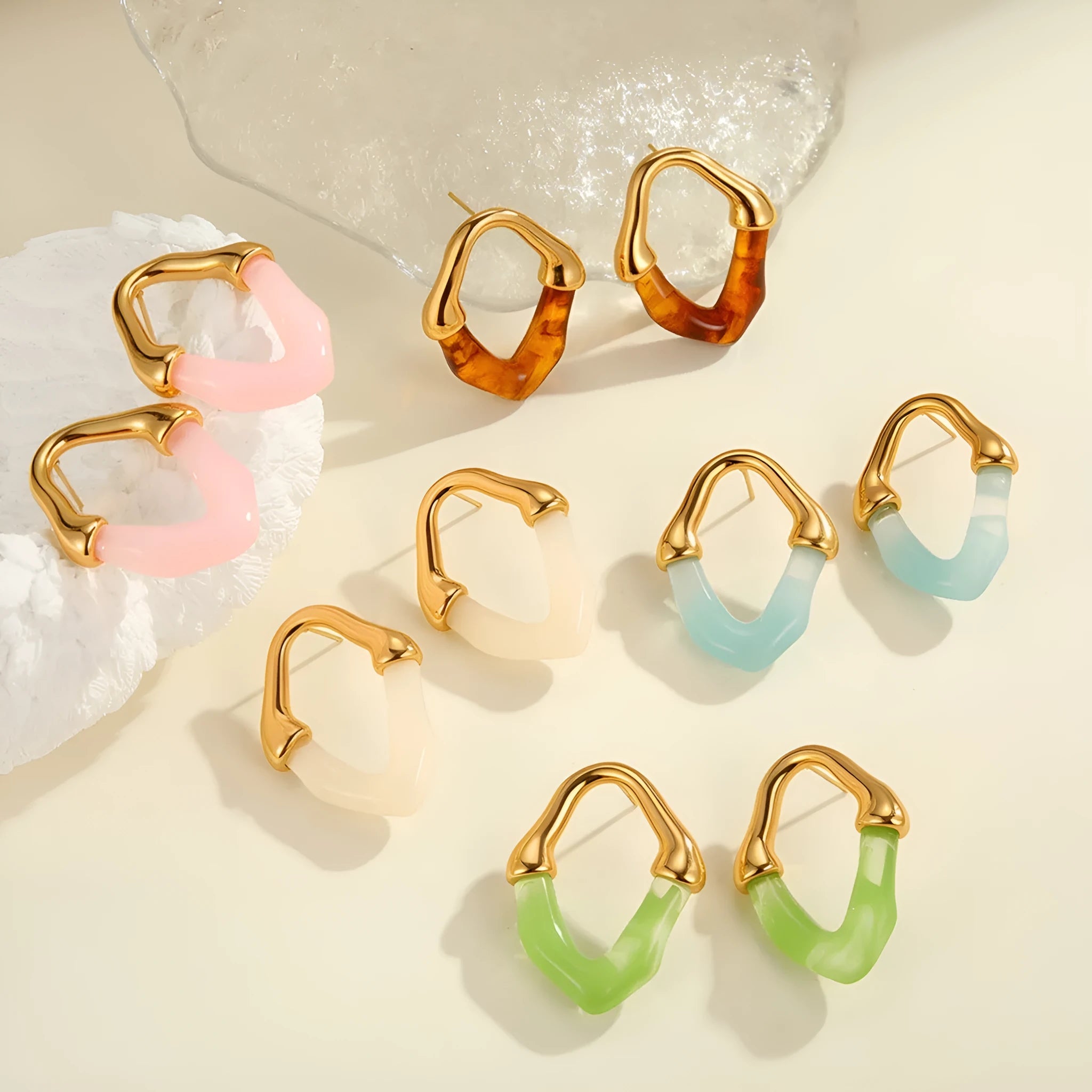 Women's stainless steel earrings with colour resin stitching in pink and blue, 18K electroplated finish