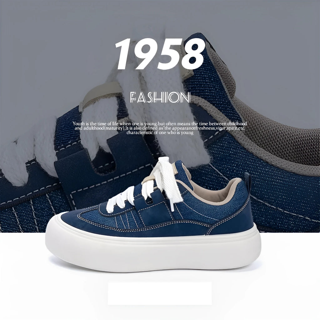 Men's black canvas platform sneakers with round toe and lace-up front on grey background