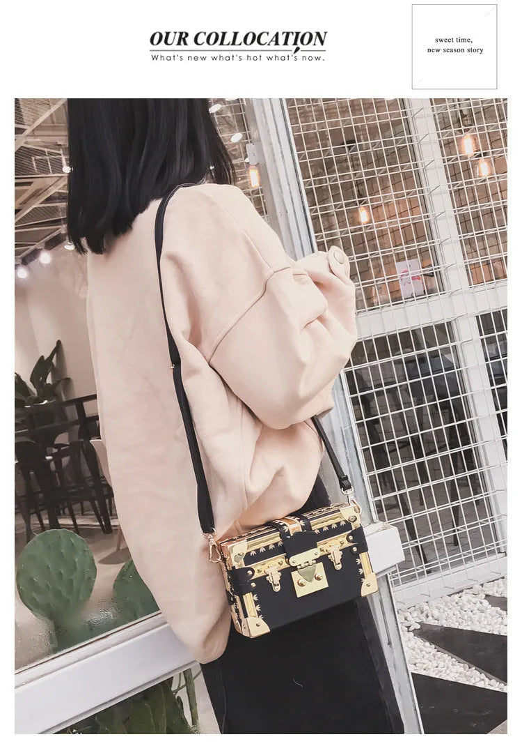 Hard PU women's shoulder bag in black with flap closure, rivet detail, and adjustable strap.