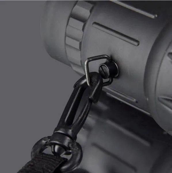 Black 16x52 high-power monocular with 52mm objective lens and eyepiece focus ring.