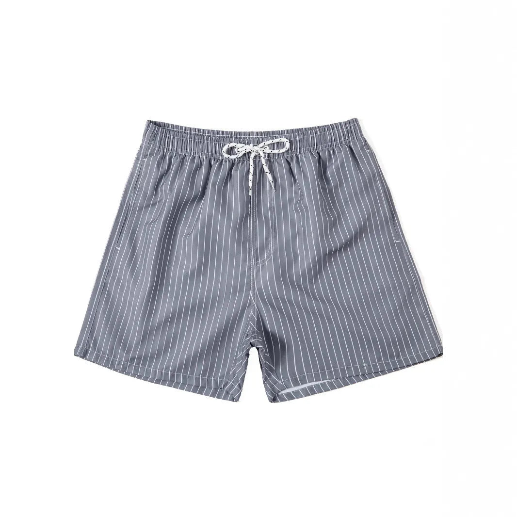 Polyester fibre striped beach shorts with straight leg opening in navy blue colour