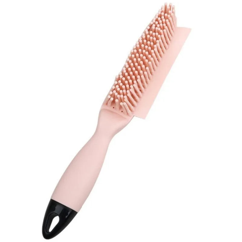 Green silicone pet hair remover brush with plastic handle on a fabric sofa