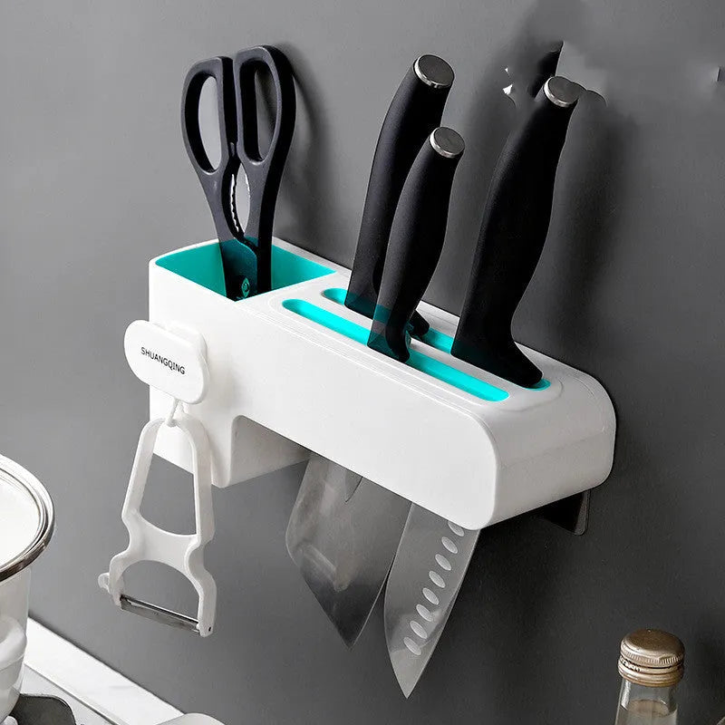 White plastic kitchen knife storage rack with compact dimensions on kitchen worktop