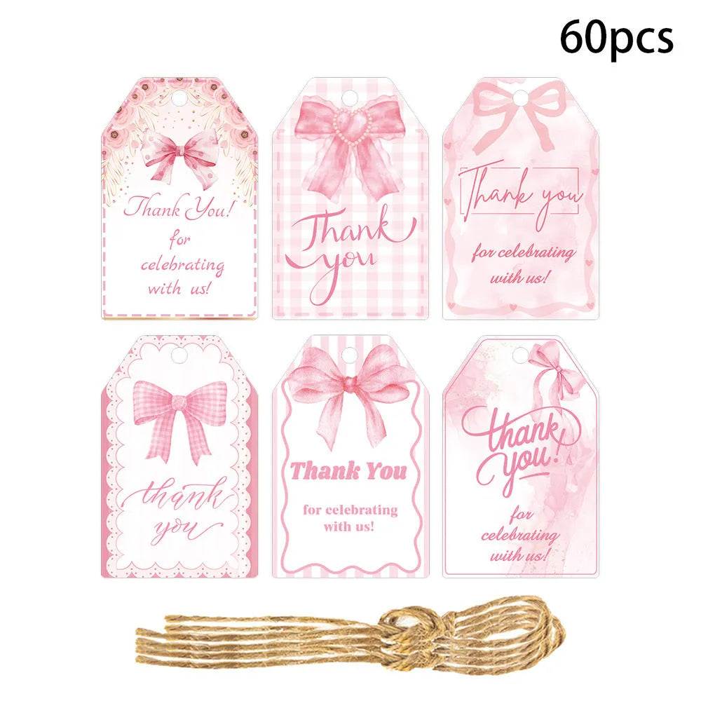 Sixty paper bowknot gift tags with natural hemp rope in three different designs for birthday parties.