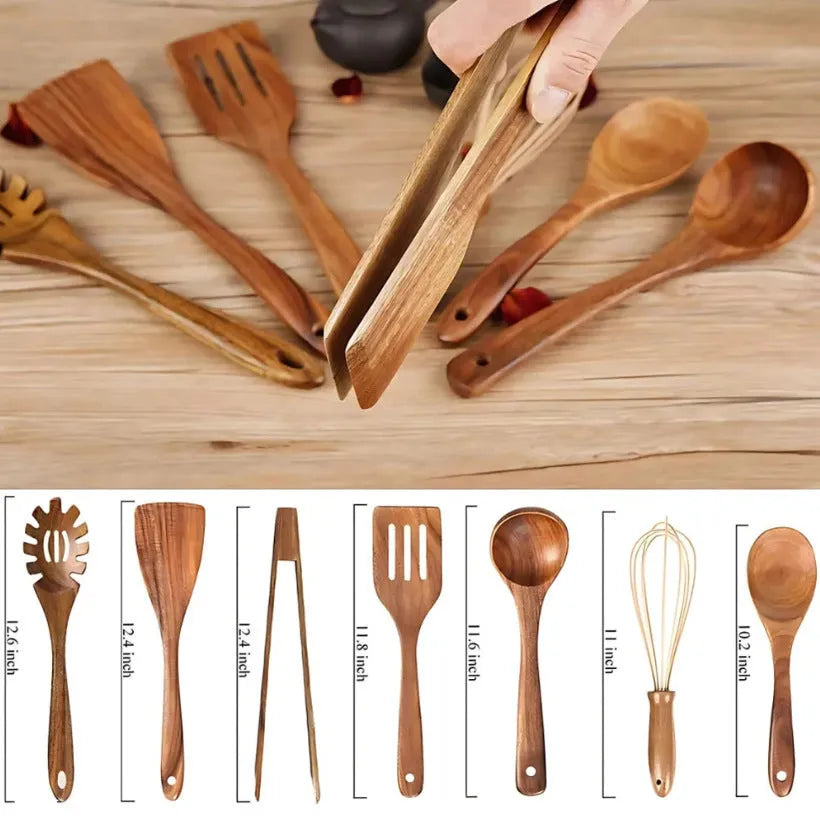 Seven wooden cooking utensils including spoons and spatulas arranged together
