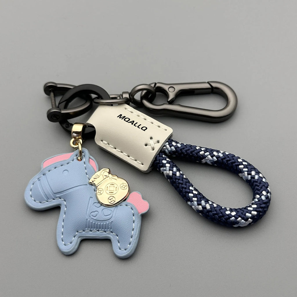 Handmade cowhide car key ring pendant with zinc alloy pony belt buckle on a colourful flanelle rope.