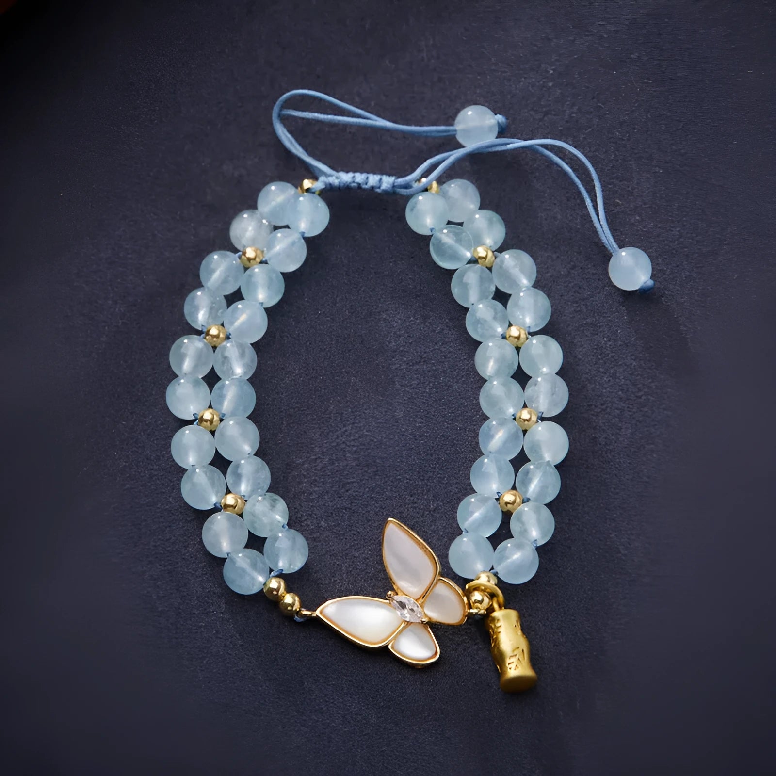 Handmade women's woven bracelet with butterfly design in aquamarine, amethyst or moonstone gemstones