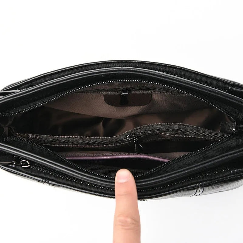 Small square sheepskin shoulder messenger bag with soft handle and double strap in solid colour