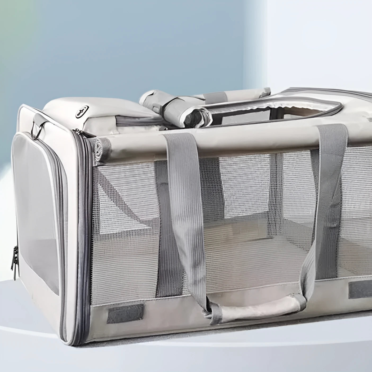 Beige portable pet carrier bag for dogs and cats with breathable mesh sides and top handle