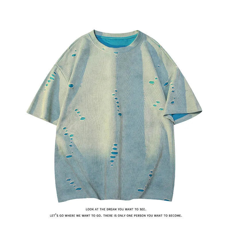 Men's blue cotton blend ripped short sleeve t-shirt showing relaxed fit and distressed detailing