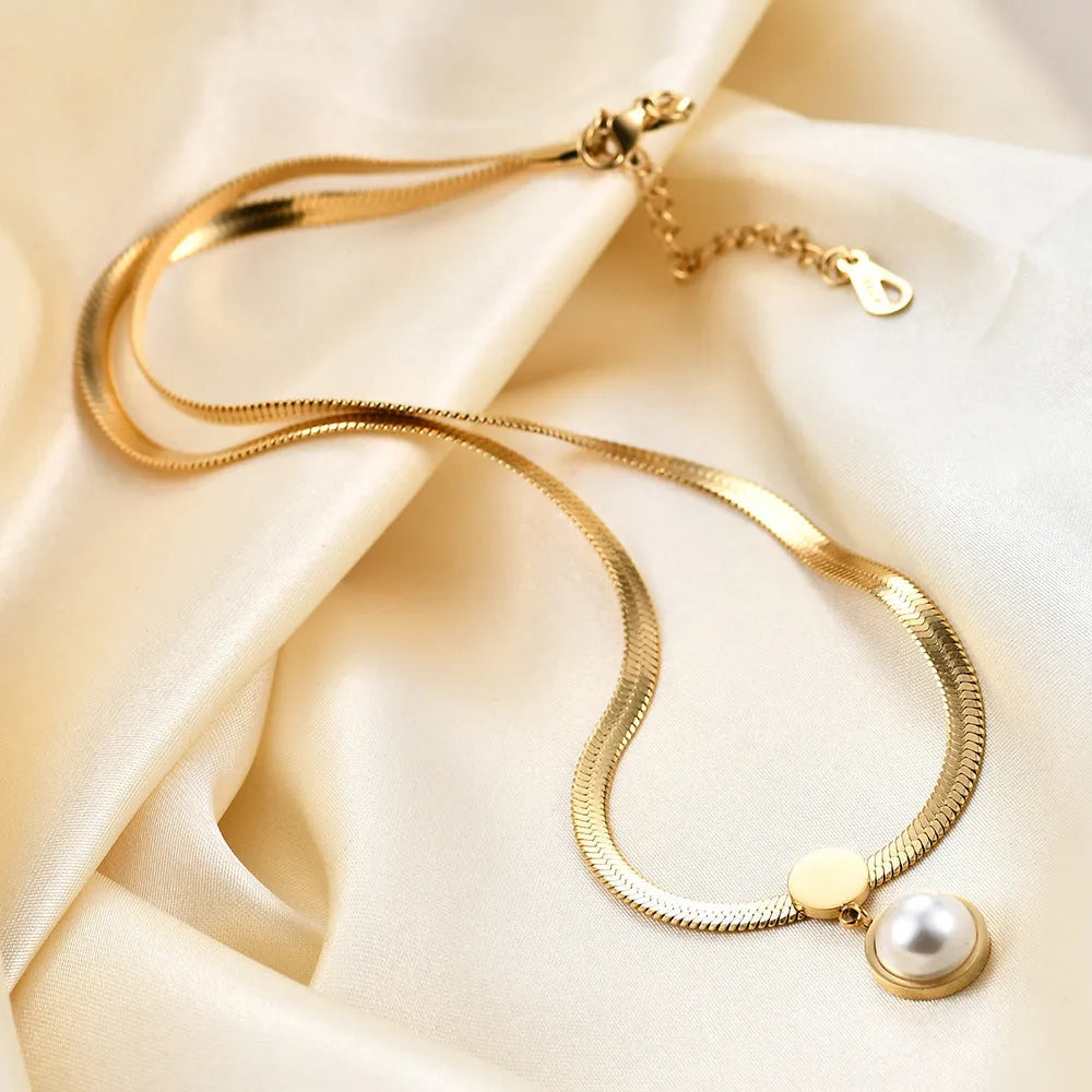 8mm titanium steel flat snake blade necklace in gold colour on a white background