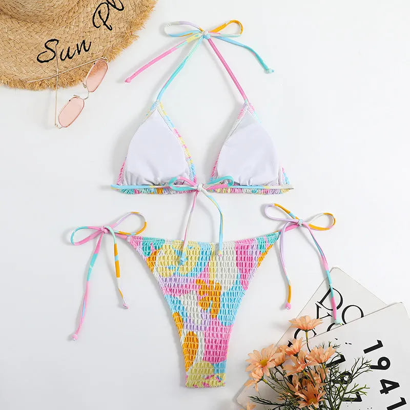 Multicolour floral gradient triangle bag bikini swimsuit with smocking detail for women.