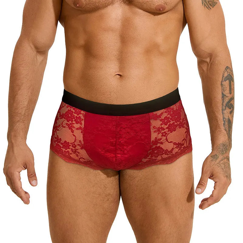 Men's black lace briefs with hollow out see-through design showing fabric texture