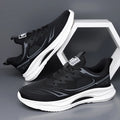 Men's low-top casual sneakers in breathable woven mesh with a round toe and rubber sole.