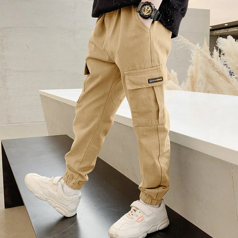 Boys' cotton casual trousers in army green, black, or khaki showing summer overalls style and non-opening crotch design