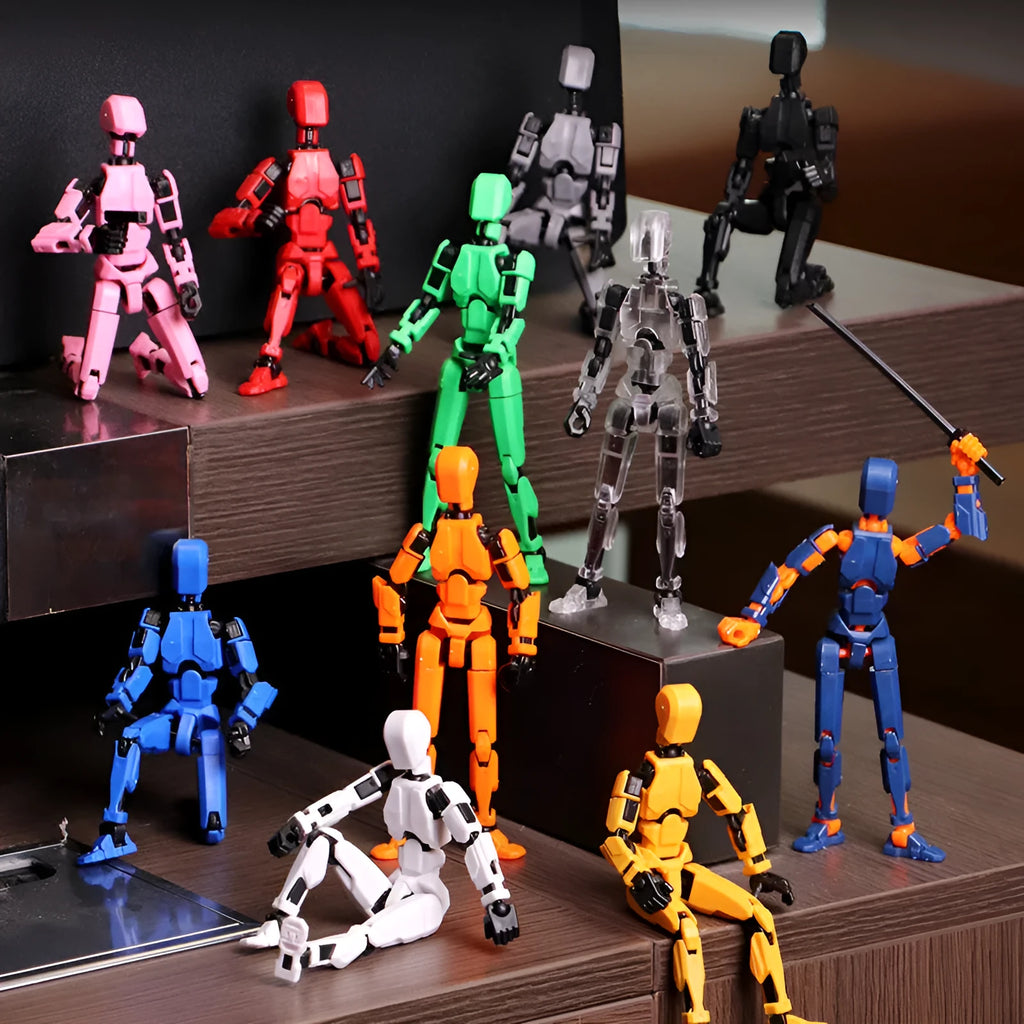 3D printed multi-jointed robot action figure model with movable joints on a desk.