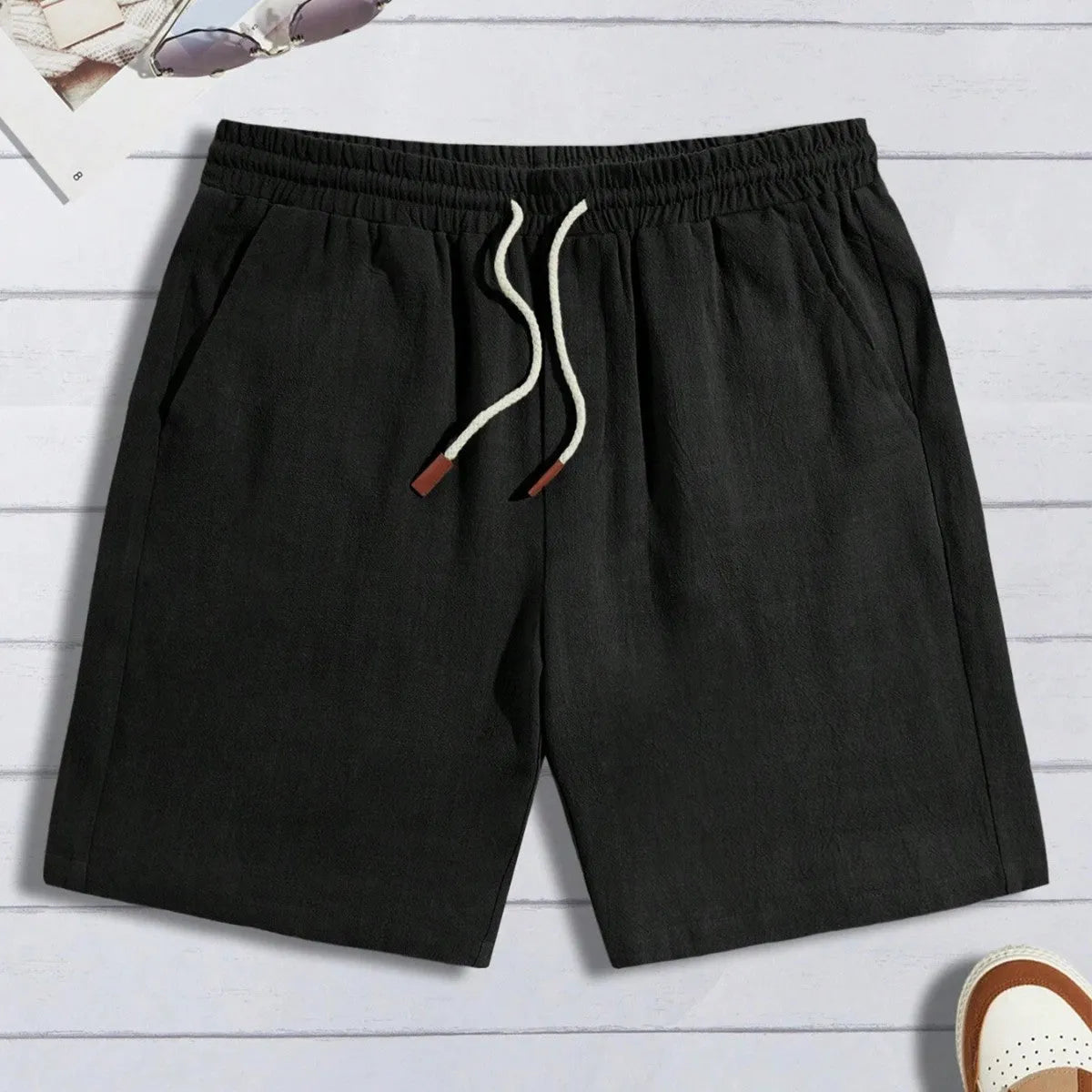 Men's thin linen loose casual shorts in khaki, front view