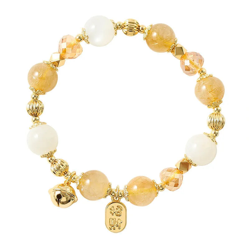 Korean style gold crystal bracelet with rutilated quartz stones and electroplated finish.