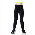 Children's black and green polyester-spandex sportswear set with T-shirt and trousers.