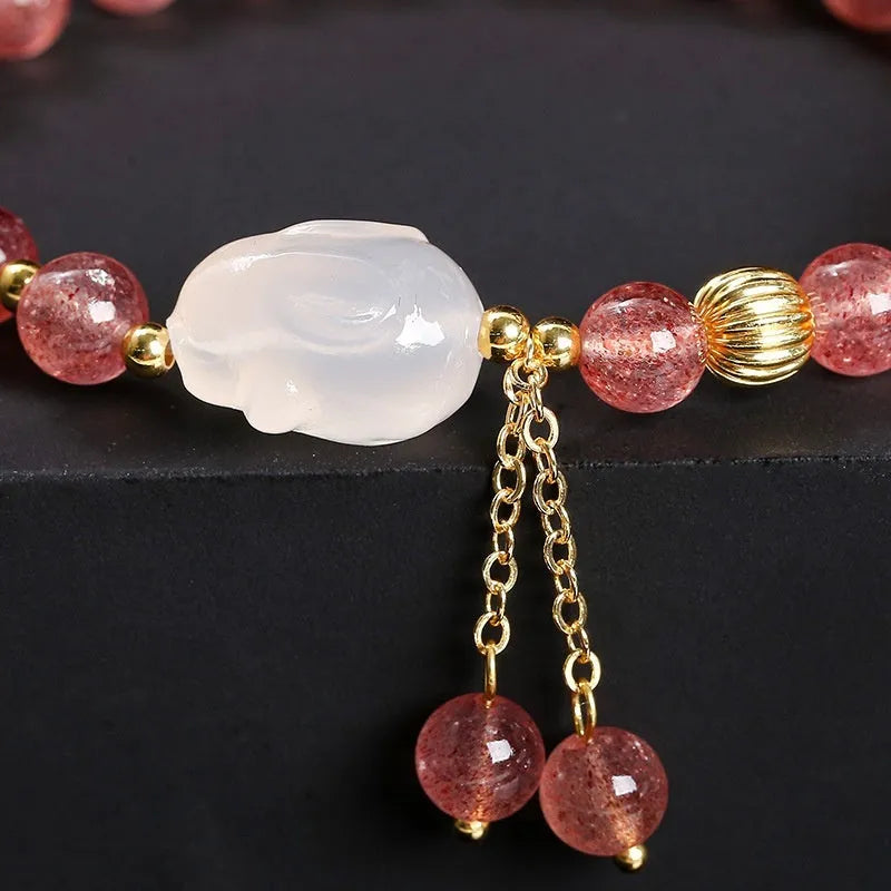 Women's strawberry quartz agate bracelet with white rabbit charms and 6mm geometric beads