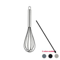 Black silicone kitchen utensil set with 12 tools in a rotating storage bucket on a kitchen countertop
