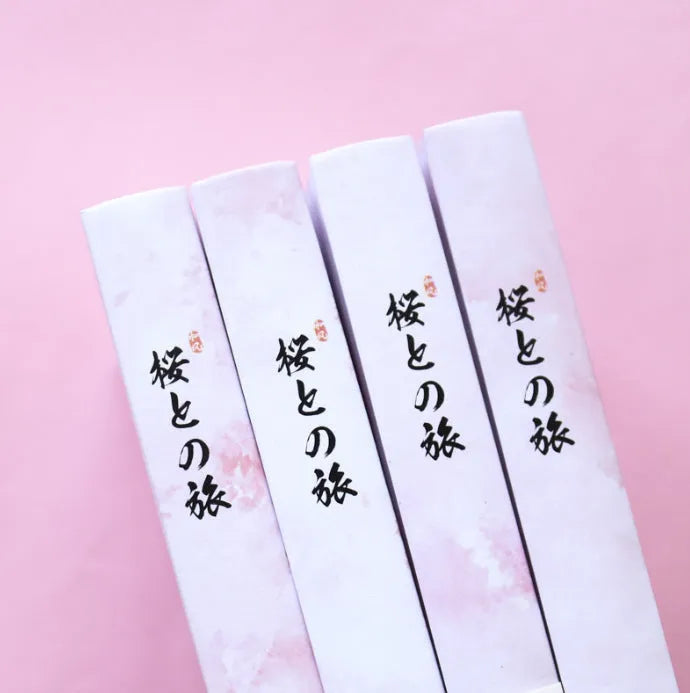 Muco hardcover notebook with sakura flower orbit AR design in pink, green, red, and yellow colour options