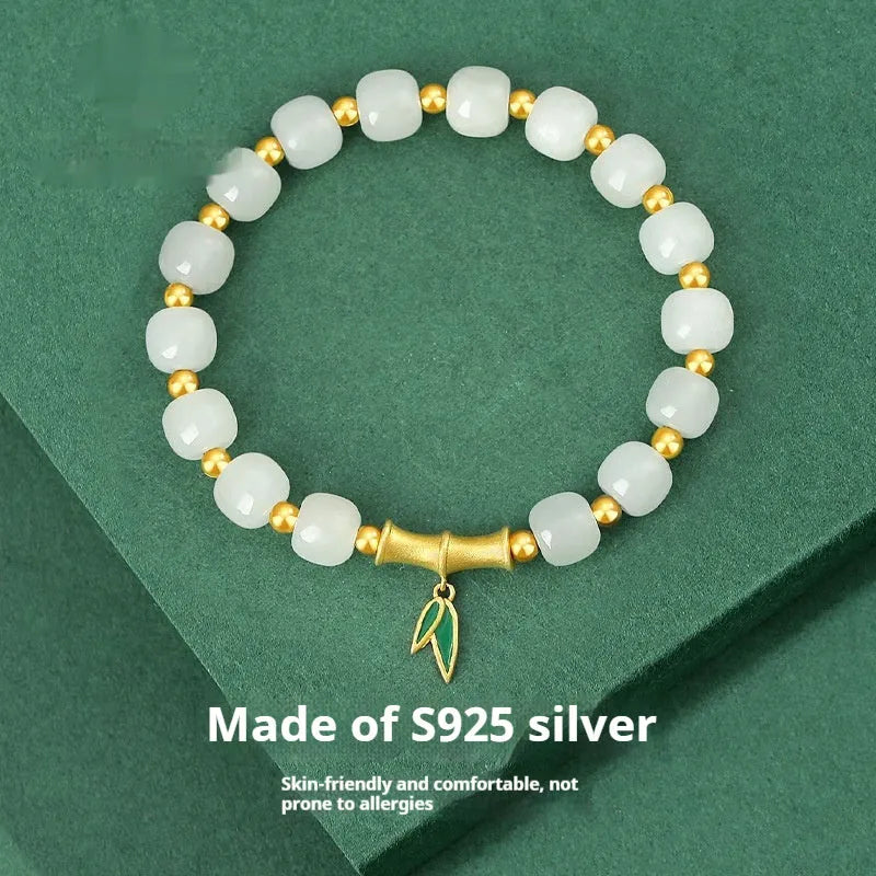 S925 sterling silver bracelet with Hetian jade beads and bamboo leaf charms in gold colour