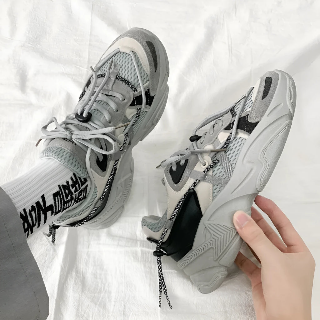 Men's white Korean-style platform dad sneakers with lace-up front and breathable mesh lining.
