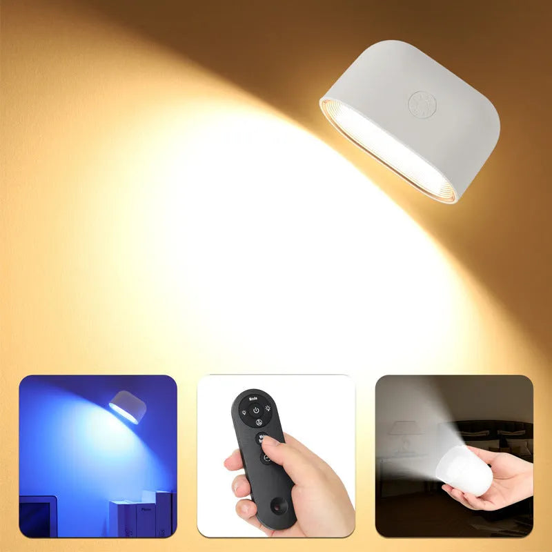 White plastic magnetic wall lamp with remote control, showing oval light face and adhesive mounting pads.
